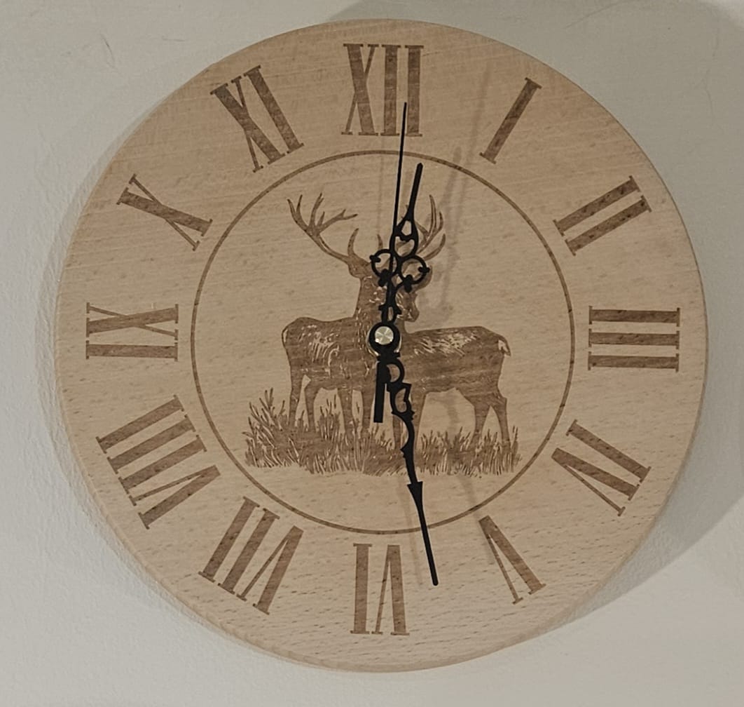 Beech Wood Clock 25cm- engraved Pair of Deer detail