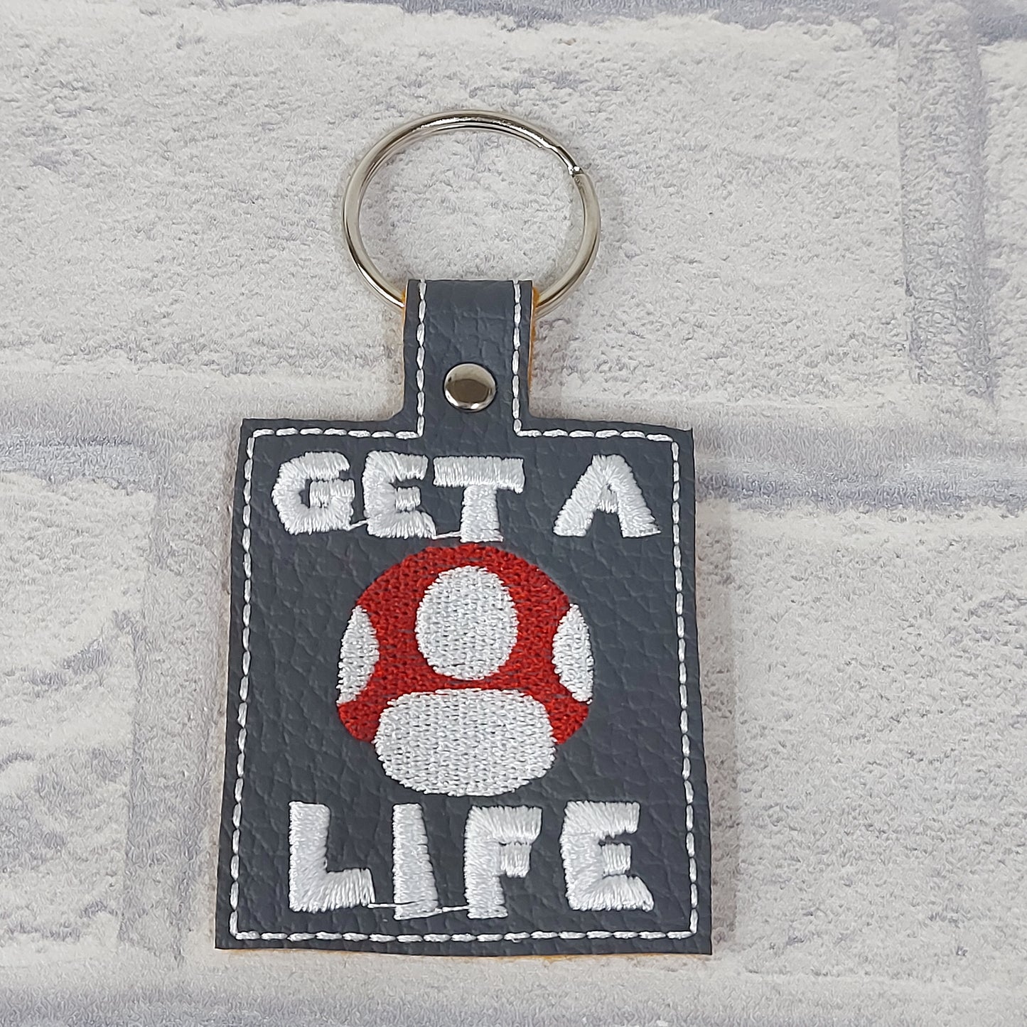 Handmade Vinyl Keyring - Get a Life