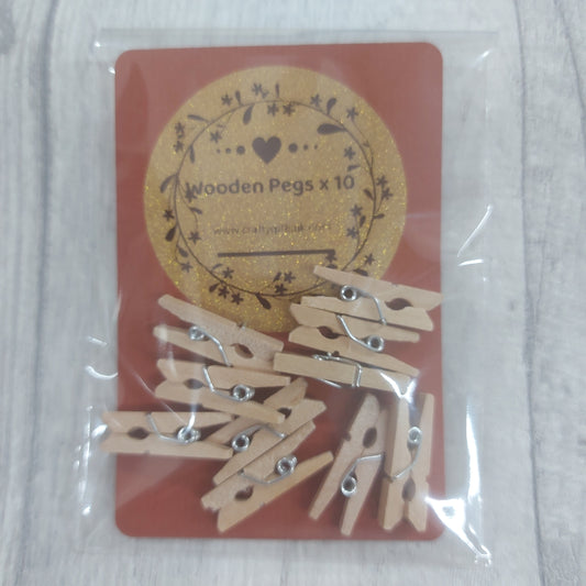 EMBELLISHMANTS -  10 x Wooden Pegs 25mm