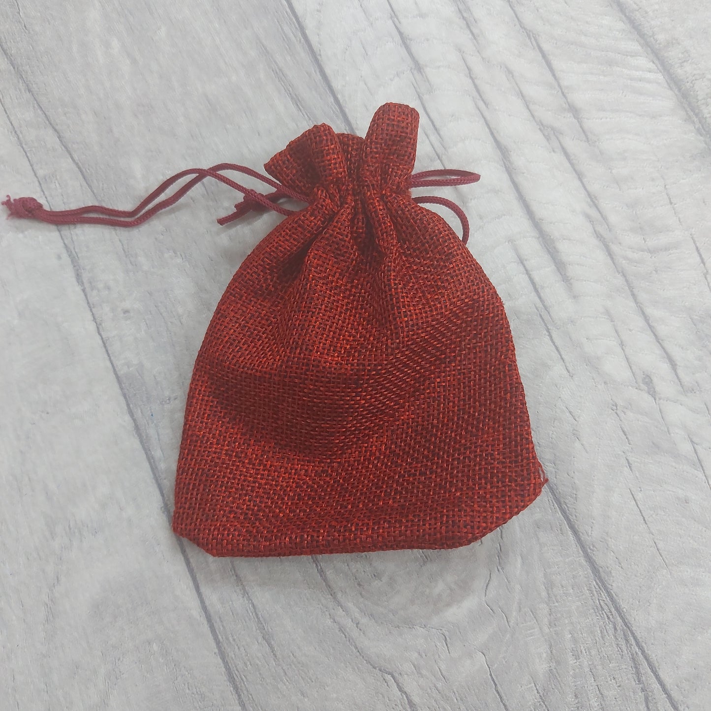 Hessian type drawstring Bag.